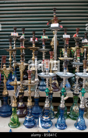 Stack of hookah pipes also known as a water pipe, Narghile,  nargeela, narghileh or nargile popular for smoking in the Arab Middle East Stock Photo