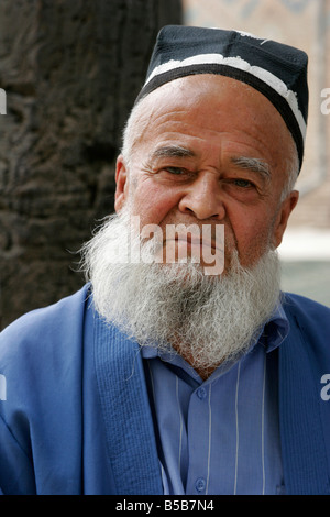 Portrait of Uzbek man wearing traditional skullcap, Uzbekistan Stock Photo