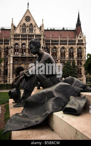 Statue of Hungarian poet, Attila Jozsef, outside Hungarian Parliament building, Pest, Budapest Hungary Stock Photo