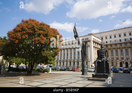 Hand and Broken Man bronze statue of 'Iuliu Maniu' in Revolution Square Piata Revolutiei in city centre. Bucharest Romania Stock Photo