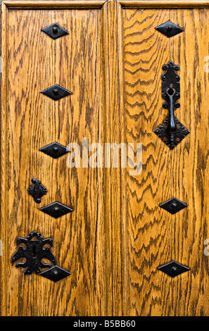 Oak door with metal plates lock and knocker Biblioteca Colombina Casa de Colon Las Palmas Gran Canaria Spain Stock Photo