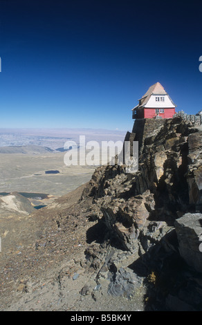 View of the old ski hut on Mt. Chacaltaya, altiplano in distance, Cordillera Real, near La Paz, Bolivia