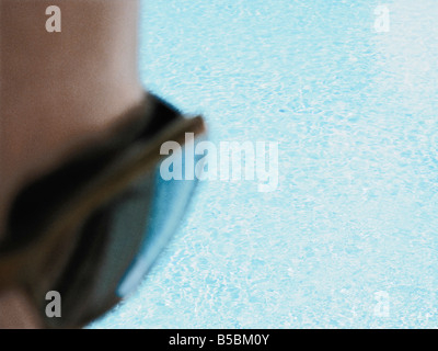 Young Woman Wearing Sunglasses Swimming Pool Stock Photo
