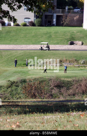 Two golfing couples on a golf course in Branson Missouri Stock Photo