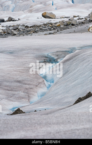 Melting ice carves streams into top of Mendenhall Glacier near Juneau, Alaska Stock Photo