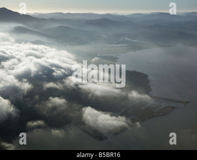aerial view above fog entering Richardson Bay at Sausalito Marin County California Stock Photo