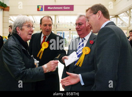 Liberal Democrat candidate in the Glenrothes by election Harry Wills centre with Tavish Scott left and Simon Hughes Stock Photo