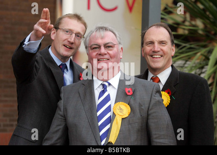 Liberal Democrat candidate in the Glenrothes by election Harry Wills centre with Tavish Scott left and Simon Hughes Stock Photo