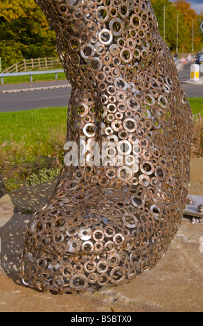 Chartist sculpture made from 27000 steel washers welded by artist Sebastien Boyesen on a roundabout in South Wales UK Stock Photo