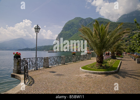 MENAGGIO PROMENADE WITH TOURIST BOATS ON LAKE COMO LOMBARDY ITALY Stock Photo