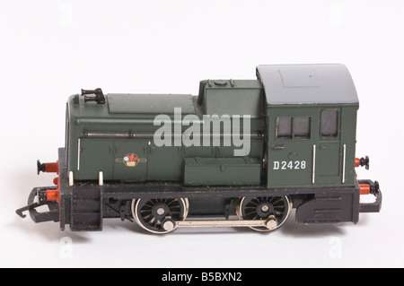 Close up of a  Hornby shunter model train in green livery shot against a white background (cut out) in a studio environment Stock Photo