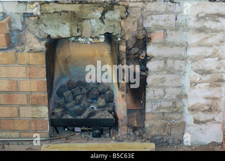 condemed Coal effect gas fire with soot and blocked chimney Stock Photo