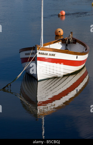 moored sailing boat with complete reflection Stock Photo