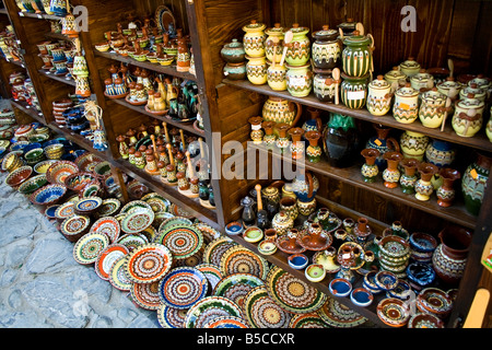 Numerous colourful porcelain plates and cups Stock Photo