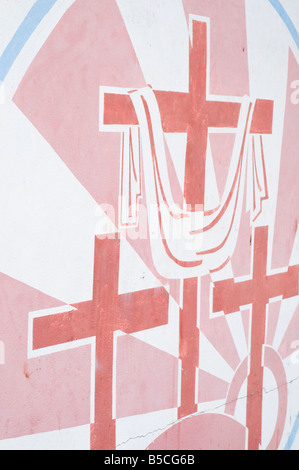 Painted crucifixes on side of building, Apia,Samoa Stock Photo