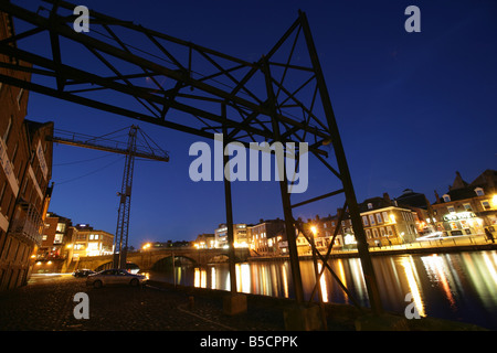 City of York, England. Woodsmill Quay cranes at Queen’s Staith with the River Ouse, Ouse Bridge and King’s Staith. Stock Photo