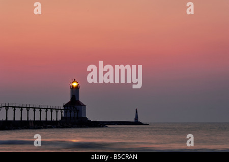 Sunset and Michigan City East Pierhead Lighthouse on Lake Michigan Michigan City Indiana Stock Photo