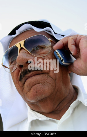 arab businessman talking on a mobile phone in dubai the united arab emirates Stock Photo