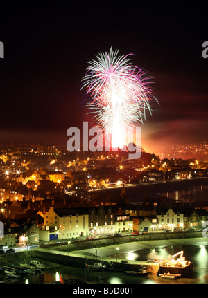 Official fireworks display in the town of Stonehaven, Aberdeenshire, Scotland, UK, seen from the harbour. Stock Photo