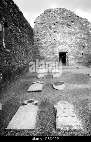 Cemetery with old tombstones on monastic site in Glendaloug near Dublin Ireland BW version Stock Photo