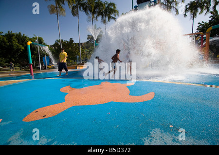 Children playing in the giant water park on The Strand on Townsville's foreshore Stock Photo