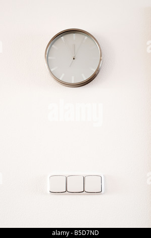 Modern clock with hours and minutes Stock Photo - Alamy