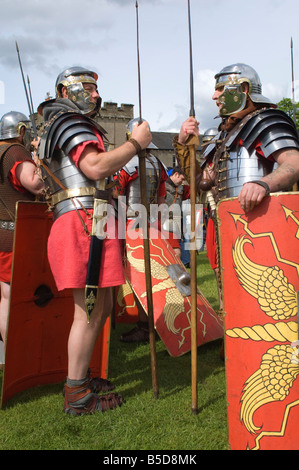 Two members of the Ermine Street Guard in conversation, Birdoswald Roman Fort, Hadrians Wall, Northumbria, England, Euruope Stock Photo