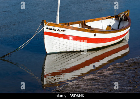 moored sailing boat with complete reflection Stock Photo