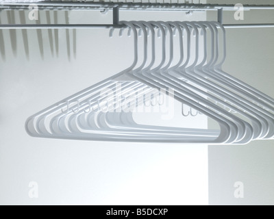 Clothing Hangers In Closet Stock Photo