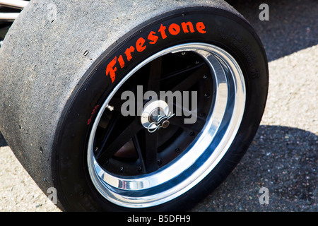 Closeup of a single slick Firestone car racing wheel and tyre at the Silverstone Classic 2008 Stock Photo