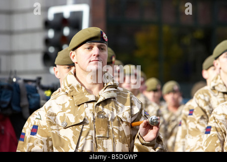 British Army major marching with members of the Royal Irish Regiment RIR parade at homecoming from Iraq and Afghanistan belfast Stock Photo