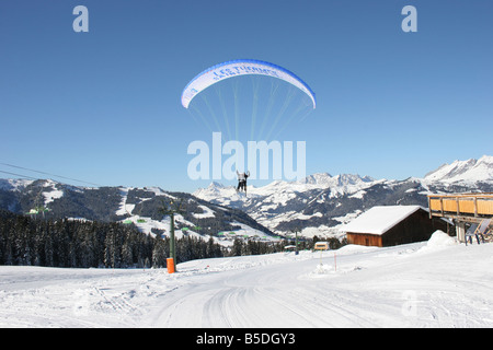 Parapente with skiers in blue sunny sky near Mt blanc. St Gervais Haute Savoie France. Horizontal.  50430 Montblanc-Ski2005 Stock Photo