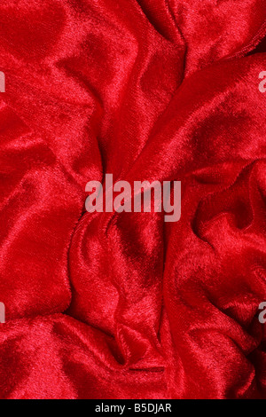 Red felt background shot from above Stock Photo