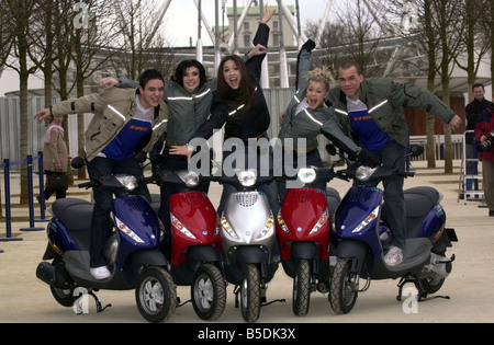 Popstars Hear Say Pop Group March 2001 Kym Marsh Danny Foster Myleene Klass Suzanne Shaw Noel Sullivan posing with motor scooters for a promotion shoot HearSay Stock Photo