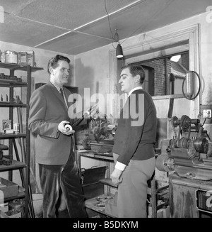 Bagpipe maker Mr. George Alexander seen here in his workshop. Circa 1960 Stock Photo