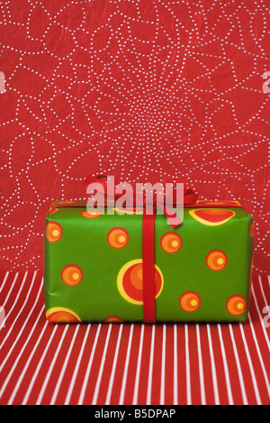 Brightly colored Christmas present Stock Photo