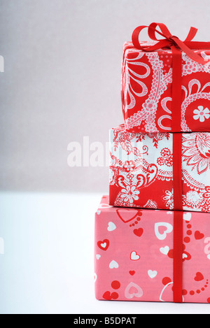 Stack of three gift-wrapped presents Stock Photo