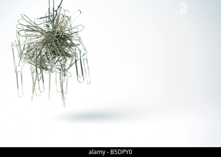 Tangle of magnetized paper clips Stock Photo