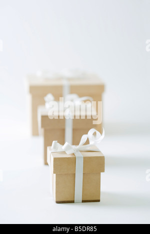 Three gifts lined up in increasing size Stock Photo