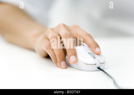 Hand using computer mouse, close-up Stock Photo