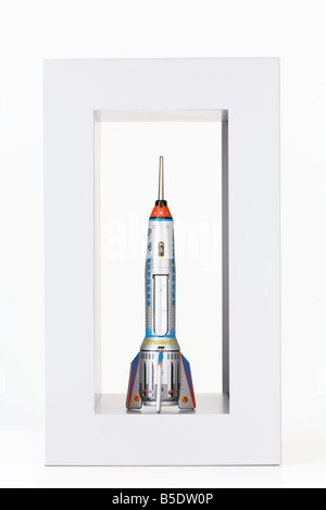 Toy rocket inside rectangular box Stock Photo