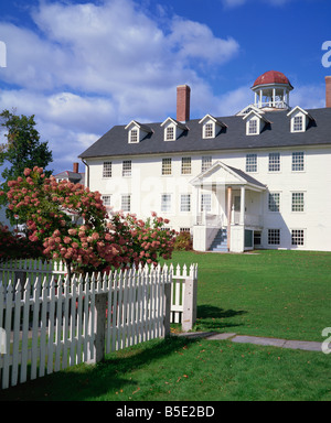 White house and picket fence in the Canterbury Shaker Village in New Hampshire New England USA R Rainford Stock Photo