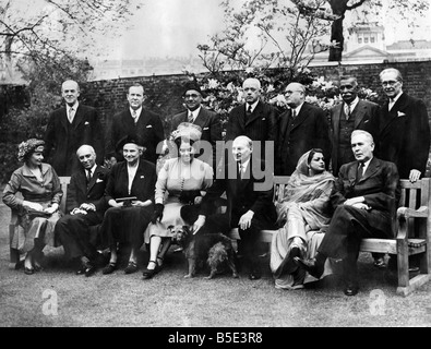 Commonwealth Conference: Left to right back row: - Sir Richard Stafford Cripps, Mr. Lester Pearson (Canada); Liaquat Ali Khan (Pakistan); Mr. Peter Fraser (New Zealand); and Dr. Malan (South Africa); Don Senayake (Ceylon); Mr. P. J. Noel Ð Baker. Left to right seated: - Mrs. Attlee; Pandit Nehru (India); Lady Cripps; Mrs. Malan; Mr. Clement Attlee; Begum Ali Khan and Mr. Joseph Chiffley (Australia). ;April 1949