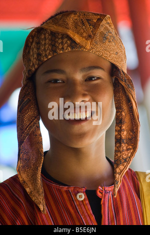 Young Man at a Funeral Ceremony at Tallunglipu Village in Tana Toraja on Sulawesi in Indonesia Stock Photo