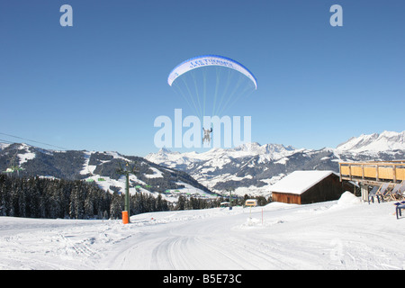 Parapente with skiers in blue sunny sky near Mt blanc. St Gervais Haute Savoie France. Horizontal.  50429 Montblanc-Ski2005 Stock Photo