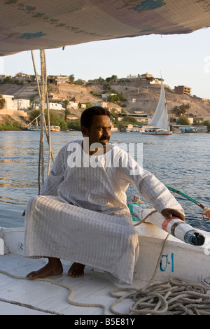 Captain of a Felucca on the Nile River in Aswan Egypt Stock Photo