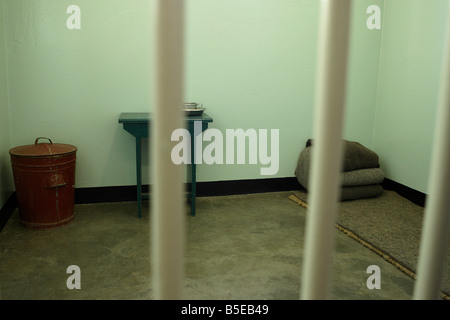The Prison Cell of Nelson Mandela during his sentence at Robben Island Maximum Security Prison , Cape Town , South Africa Stock Photo