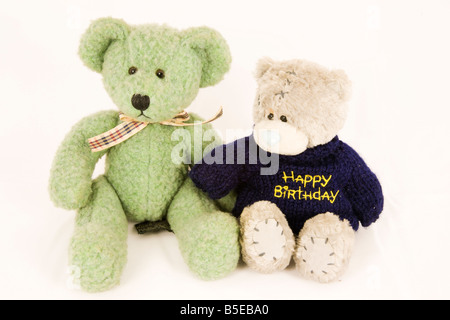 Couple of old fashioned teddy bears isolated against white background Stock Photo