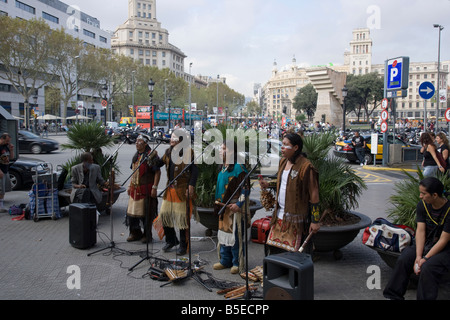 Pan pipe players Street Artist in La Rambla Barcelona Spain statue fun street entertainment entertaining playing music to sell Stock Photo