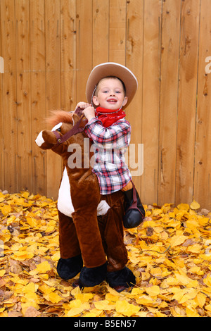 Boy dressed in cowboy costume for Halloween Stock Photo